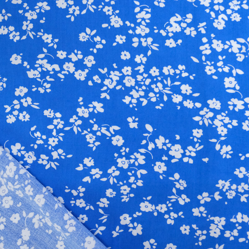 Viscose koningsblauw met kleine witte bloemetjes - Maison Klem